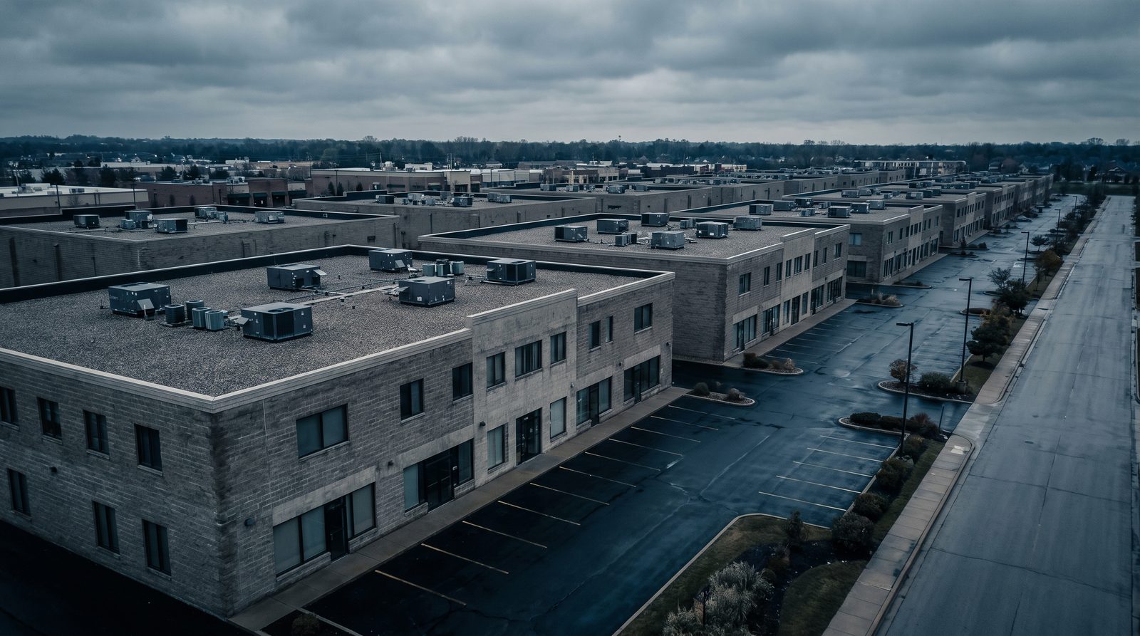 Commercial buildings with packaged rooftop units on every roof